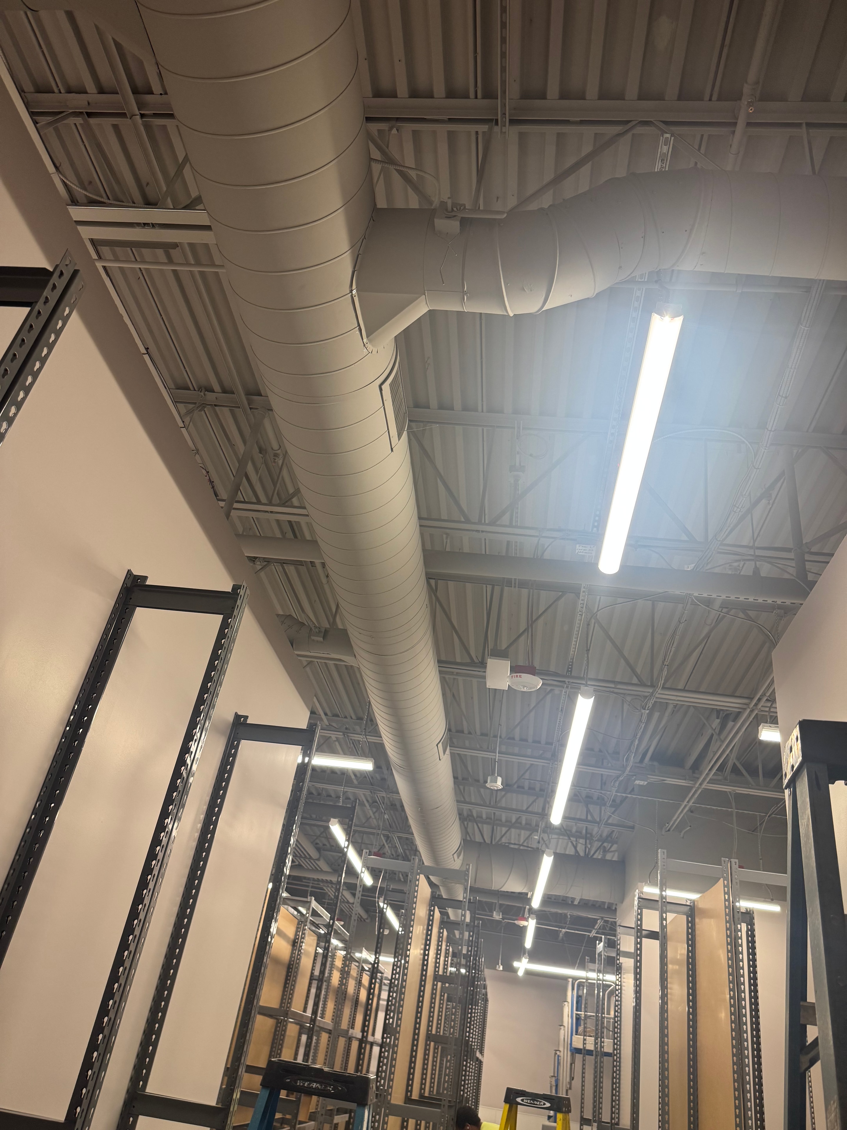 Finished retail ceiling — spiral mains and supply drops