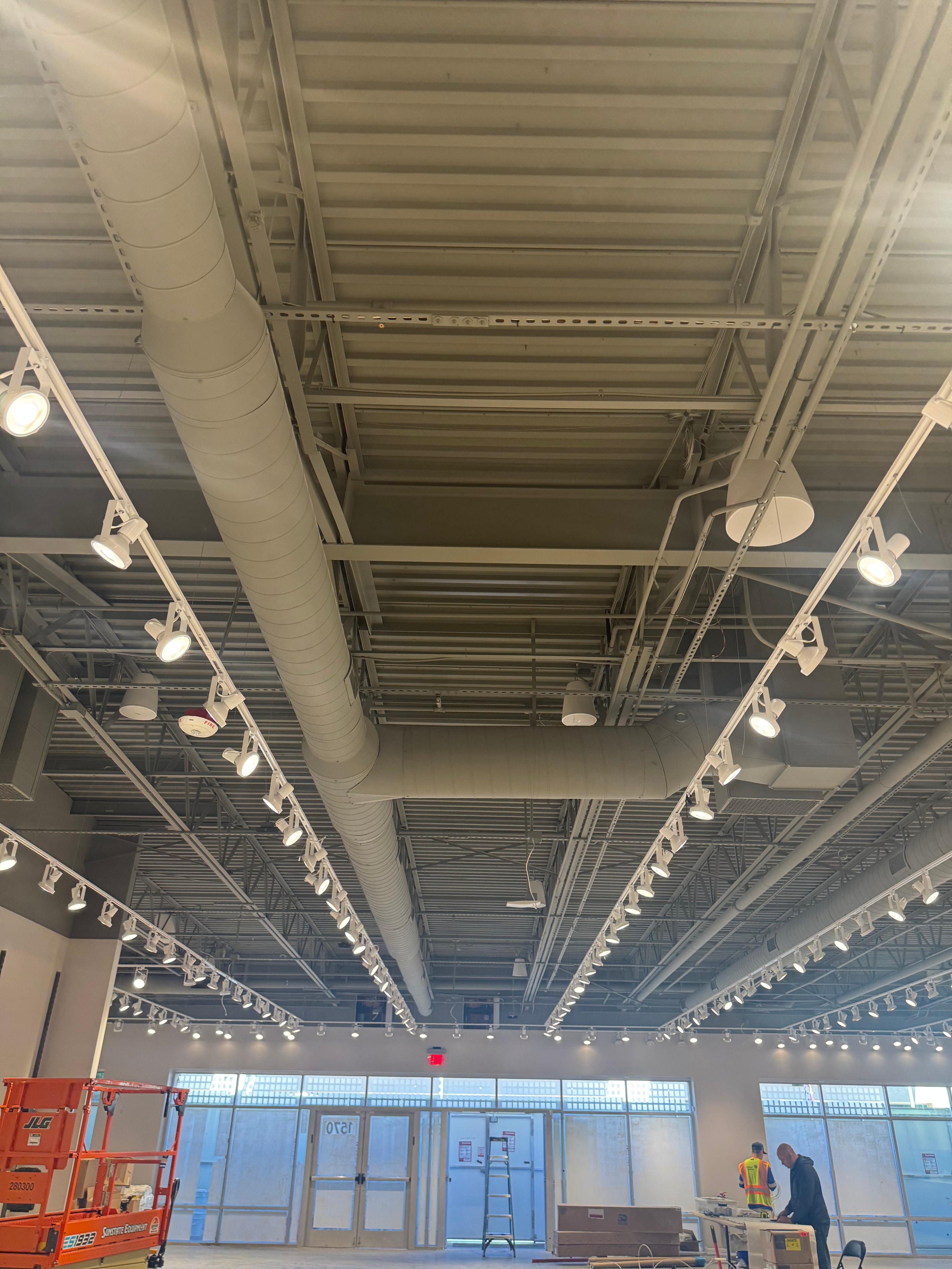 Back-of-house — spiral duct system above storage area